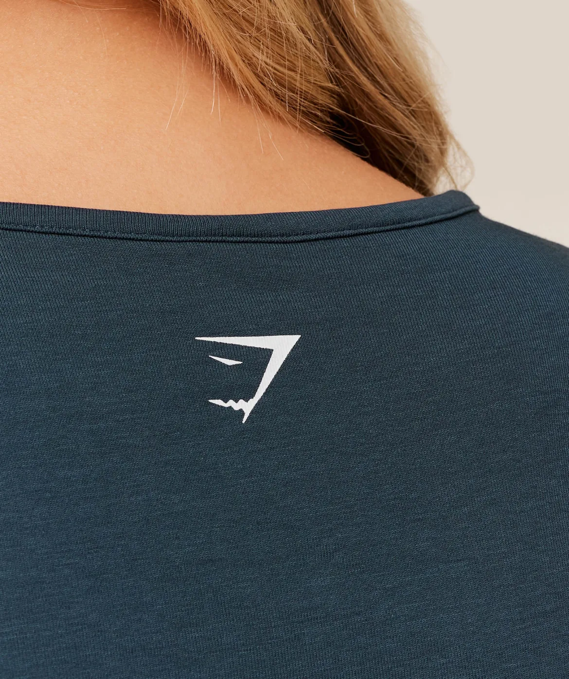 Worn Crest Graphic Baby Tee